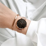 Daniel Wellington Petite Melrose Black Dial Rose Gold Mesh Strap Watch For Women - DW00100303